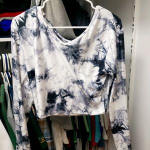 A marble patterned long sleeve shirt
